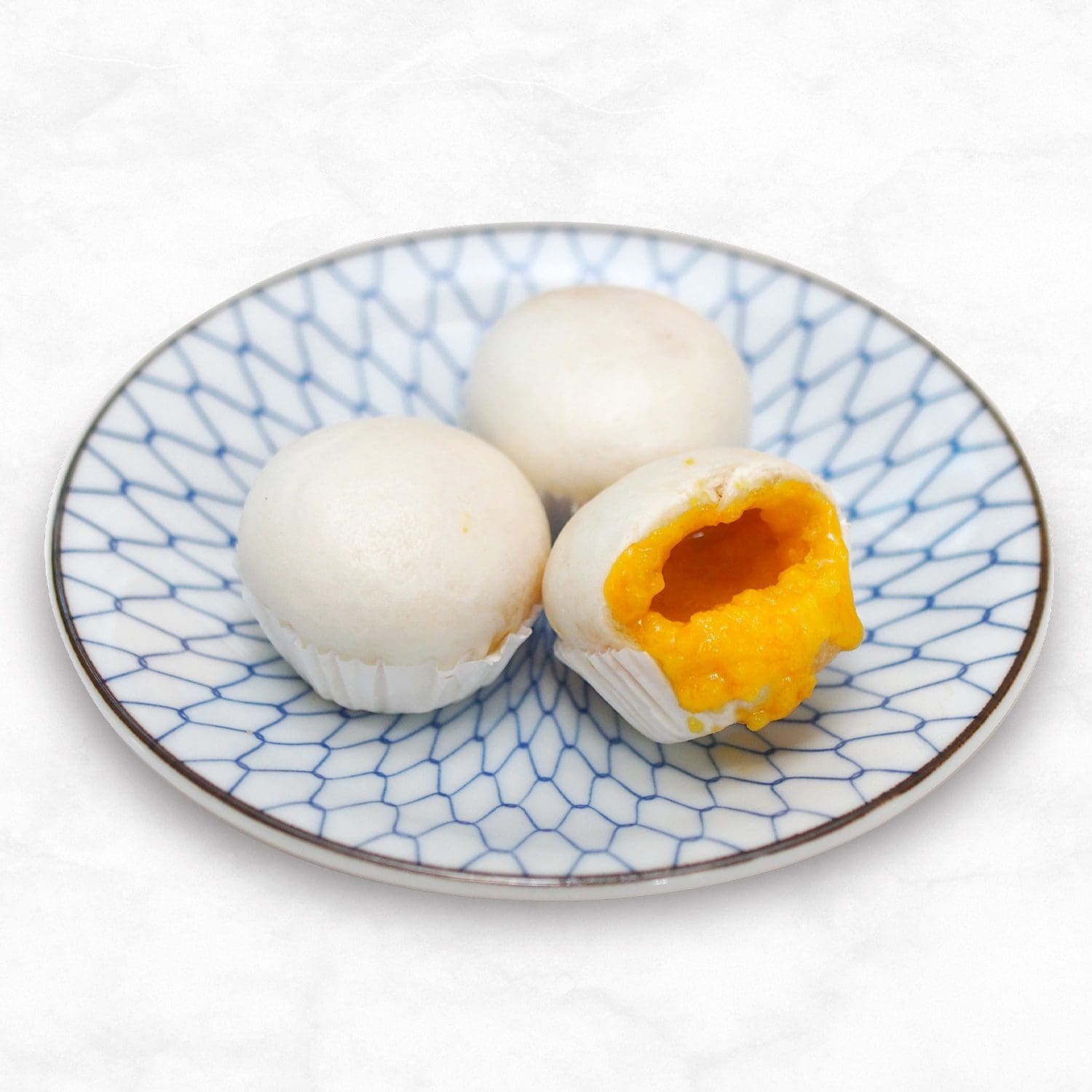 Tim Ho Wan—Steamed Golden Lava Salted Egg Buns (image supplied ...